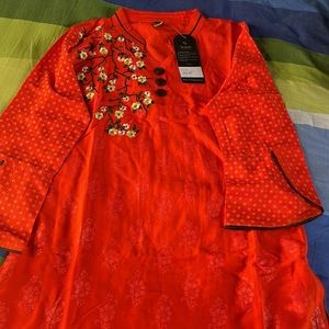 Shoilpik art and fashion, metallic designate dress(kurti). Orange color.